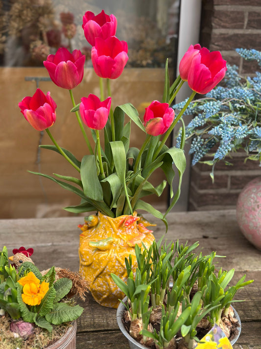 Beautiful pink tulip bouquet in a vase