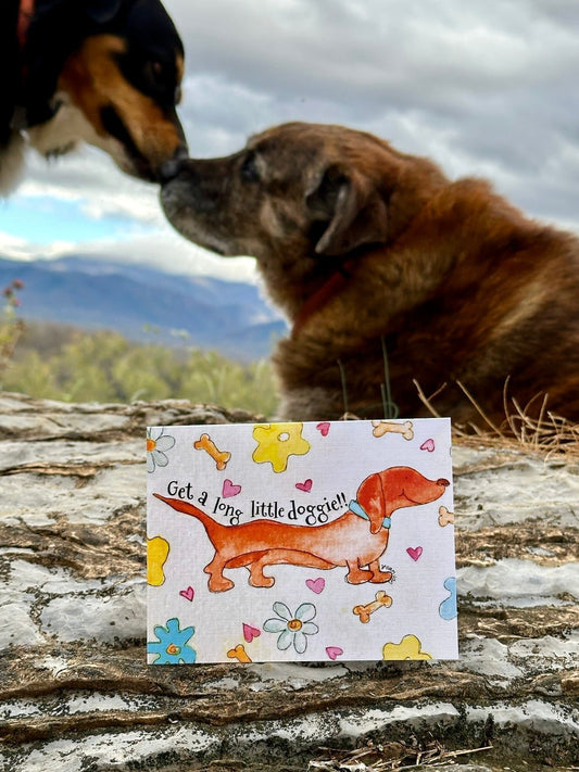 Get a long little doggie Weiner Dog Daschund Greeting Card with doggies in the background