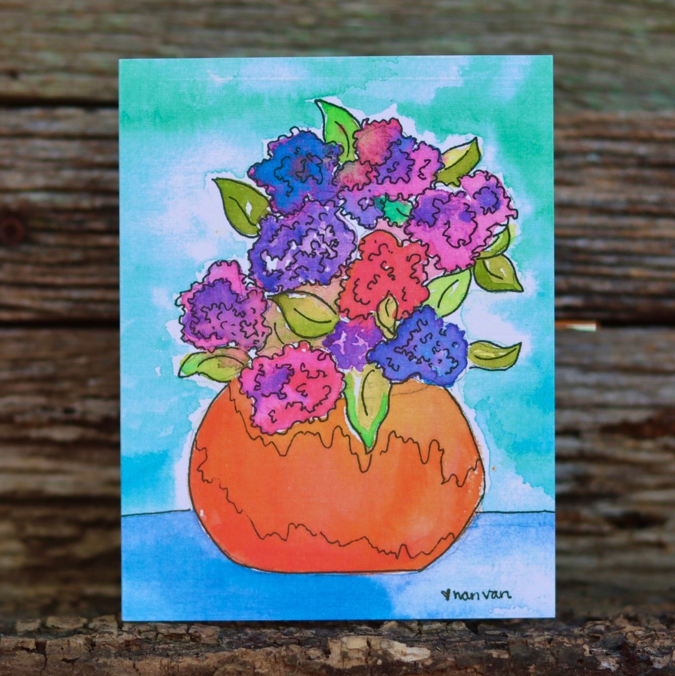 Colorful hydrangeas in an orange vase card