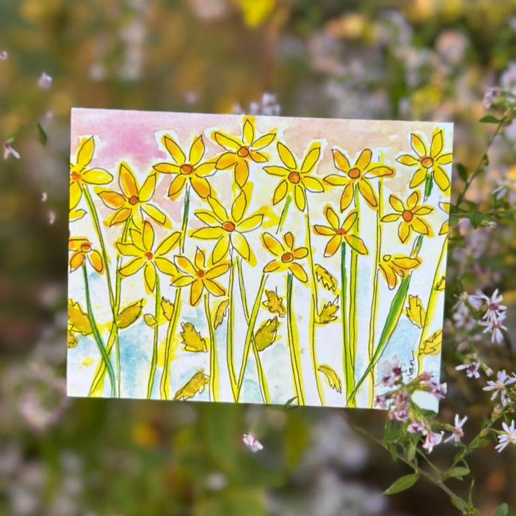 Daisy patch with beautiful sky greeting card