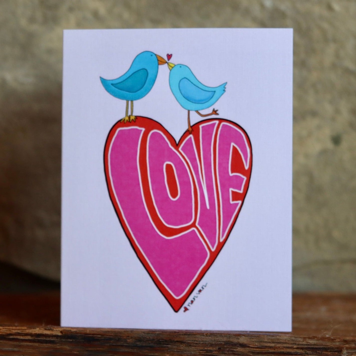 'Love' Birds Perched on a Heart Greeting Card