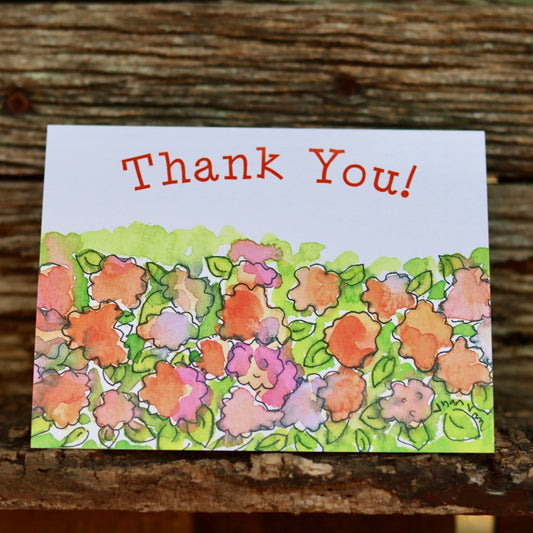 Thank you text pink and orange flowers greeting card