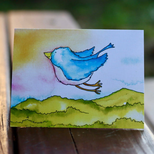 The Grace Bird bluebird soaring over the mountains card