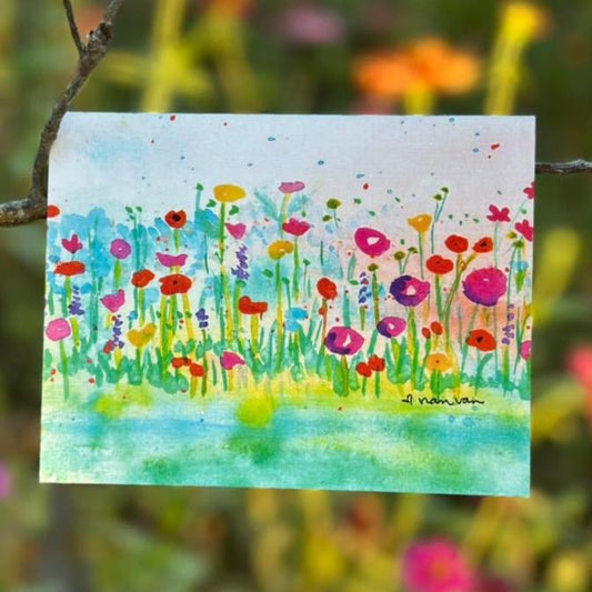 Colorful wildflowers by the water greeting card
